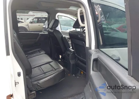 2012 Nissan Titan Sl z USA, uszkodzony, nr VIN 1N6BA0ED2CN327716